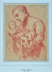 Giovane religioso che tiene un bambino