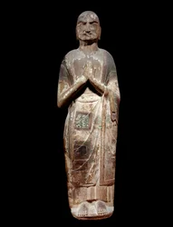 Arte cinese: statua che rappresenta un kasyapa, monaco discepolo di Buddha. Dinastia Sui (581-618 d.C.). Parigi, Museo Guimet, Museo delle Arti Asiatiche