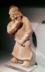 Figurina di un attore che fischia, da Jiaozuo, Henan, Dinastia Yuan (1271-1368)