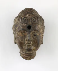 Testa di una divinità, probabilmente dinastia Ming