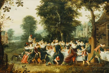 Figure eleganti sedute a un tavolo da banchetto in una radura boschiva