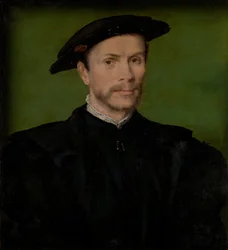 Ritratto di un uomo barbuto in nero.