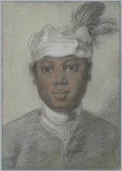 Testa di un giovane uomo nero con turbante piumato