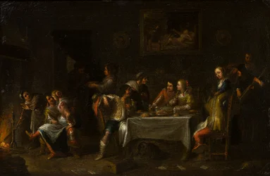 Signore e signori che banchettano intorno a un tavolo