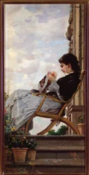 Donna che cuce sulla terrazza