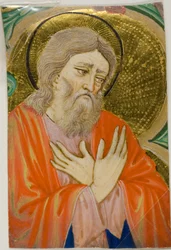 Santo in una iniziale istoriata da un libro corale