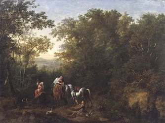 Una festa di falconeria in un paesaggio boscoso