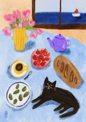 Una rilassante colazione in riva al mare con il gatto