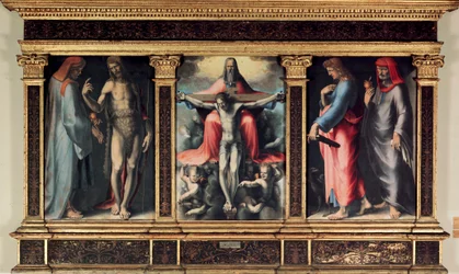 Trittico della Trinità: San Cosma, San Giovanni Battista, la Trinità, San Giovanni Evangelista e San Damiano. Insegna 