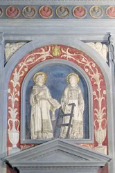 San Lorenzo e Santo Stefano, bassorilievo sopra la porta nord, c.1440 (terracotta)