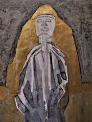 Figura meditativa dorata