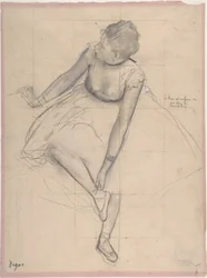 Ballerina che aggiusta la sua scarpetta
