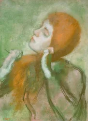 Donna che si pettina
