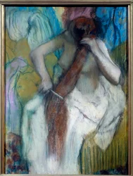 Donna che si pettina. Pastello di Edgar Degas