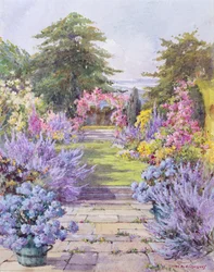 Il sentiero di pietra in un giardino estivo