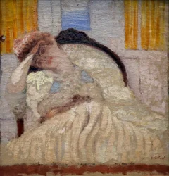 Misia seduta in una poltrona