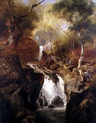 Cascata attraverso un bosco