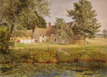 Edifici in pietra, stendibiancheria e stagno di ninfee