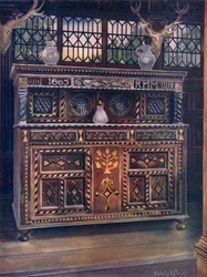 Credenza scolpita e intarsiata in quercia