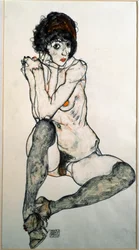 Nudo femminile seduto