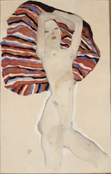 Nudo contro materiale colorato