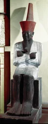 Antichità egizia: statua del faraone Montuhotep II. XI dinastia. Da Deir el Bahari. Dim. 83 cm. Il Cairo, Museo Egizio