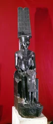 Statua seduta del dio Amon che protegge Tutankhamon, Nuovo Regno, c.1336-1327 a.C.