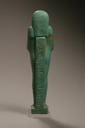 Vista posteriore di una figura Ushabti per Hekaemsaf, Ammiraglio della Flotta, regno di Amasis, 570-526 a.C. (faience)