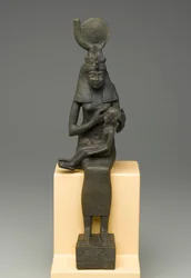 Statuetta seduta di Iside che tiene Horus (bronzo)