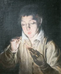 Ragazzo che soffia su un tizzone