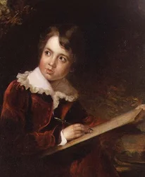 Giovane ragazzo che scrive