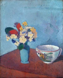Vaso con fiori e tazza