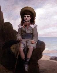 Ragazzo su una roccia con una rete da pesca