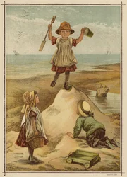Bambini che giocano a re del castello in riva al mare