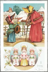 Auguri di Natale e ragazze che cantano