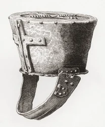 Elmo, dal Castello di Pomeroy, Inghilterra, risalente al c. XII secolo, da The British Army: Its Origins, Progress and Equipment, pubblicato nel 1868