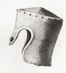 Elmo cilindrico a sommità piatta del XIII secolo con nasale, scavato al Castello di Montgomery nel 1841, da The British Army: Its Origins, Progress and Equipment, pubblicato nel 1868