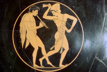 Pittura vascolare di un giovane che suona il flauto e una donna che danza, VI secolo a.C.