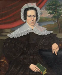 Donna con un libro verde