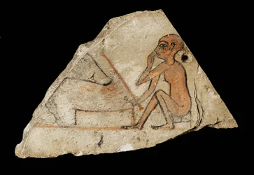 Ostracon che mostra un ragazzo e un maiale ...