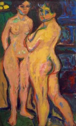 Ragazze nude in piedi vicino alla stufa