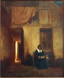 Interno con donna che legge e gatto