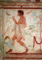 Arte etrusca: affreschi rappresentanti scene di banchetto, dettaglio di un suonatore di flauto. Tomba del Triclinio. V secolo a.C. Museo Archeologico Nazionale di Tarquinia, Italia