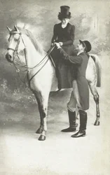 Donna e uomo in abito da equitazione (foto b/n)