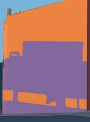Ombra di un camion da una strada sopraelevata sul lato di un edificio