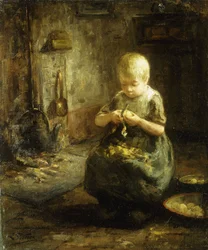 Un bambino che pela patate