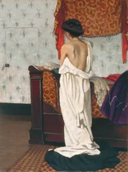 Schiena di un nudo in un interno