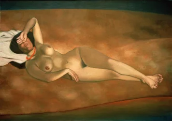 Donna sdraiata sulla sabbia