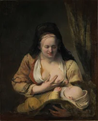 Donna che allatta un bambino
