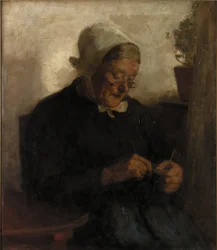 Vecchia donna che fa la maglia
